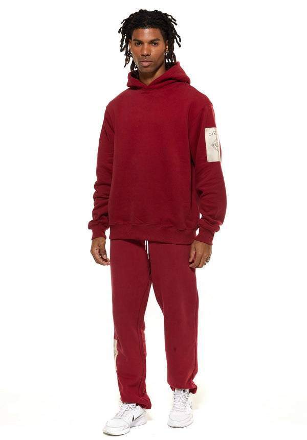 Sudadera con capucha en rojo intenso con parche Cenmar